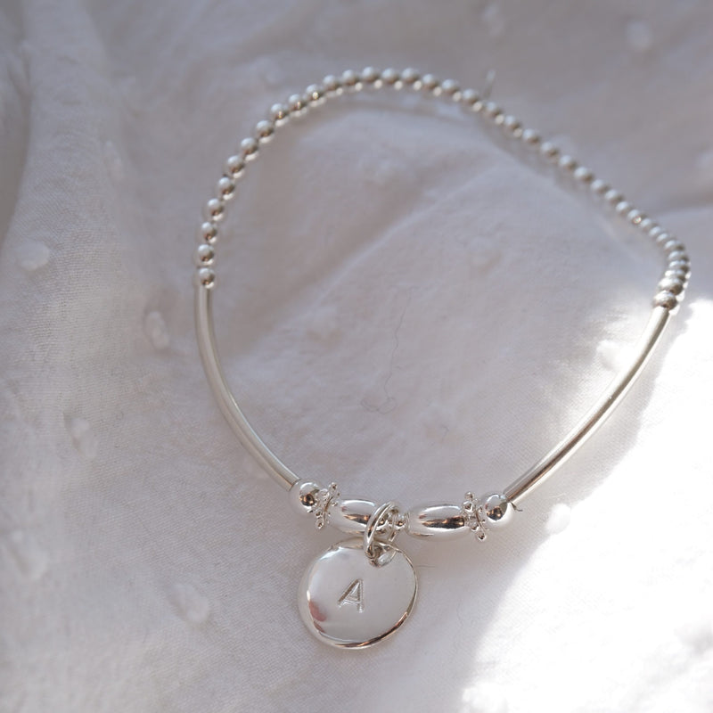Sterling Silver Beaded Noodle Bracelet With Stamped Disc
