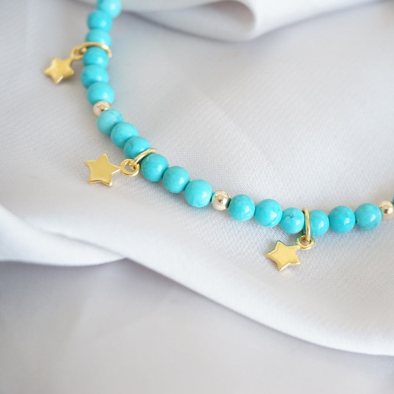 Gold and Turquoise Bracelet With Stars