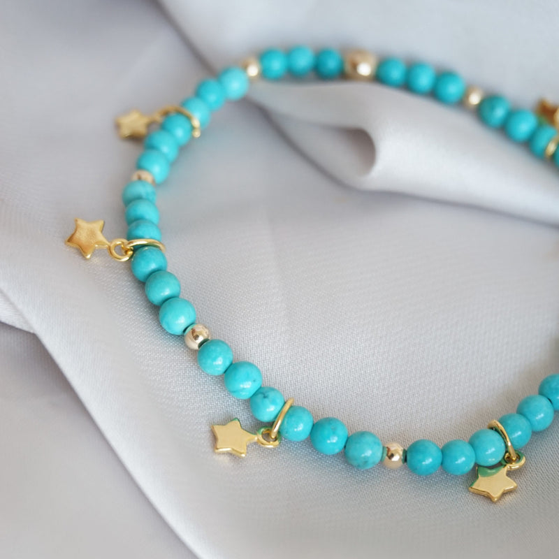 Gold and Turquoise Bracelet With Stars