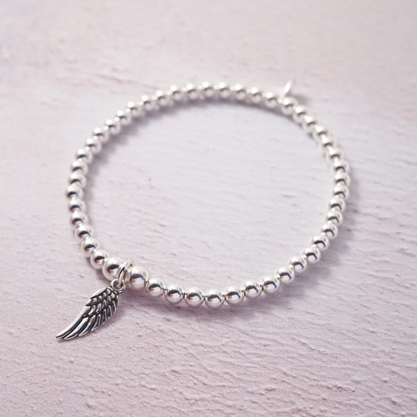 Sterling Silver Stretch Bracelet With Angel Wing Charm