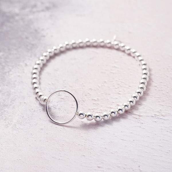 Sterling Silver Stretch Bracelet With Karma Circle