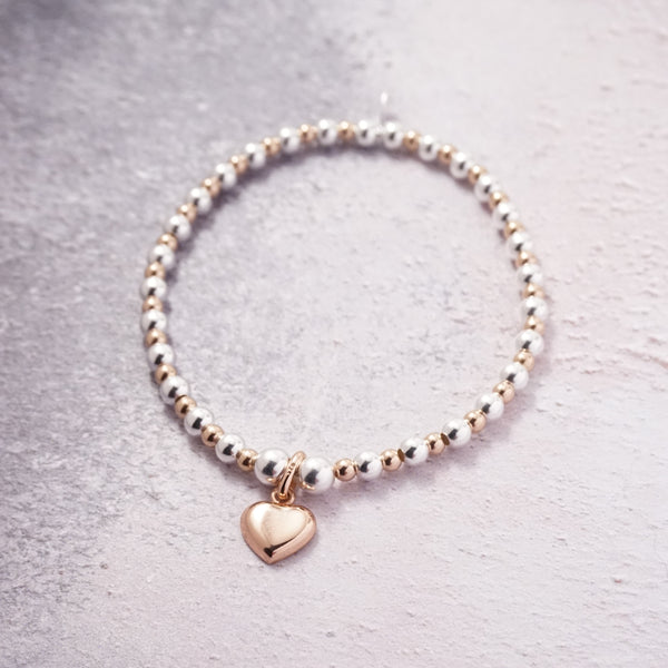 Sterling Silver and Rose Gold Bracelet With Heart Charm