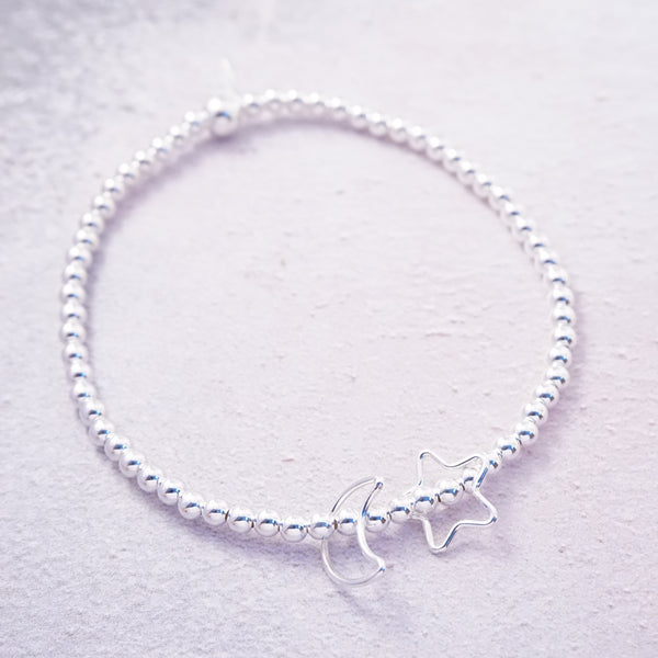 Sterling Silver Bracelet With Moon and Star Charms