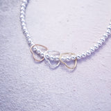 Sterling Silver, Rose Gold and Gold Hearts Bracelet