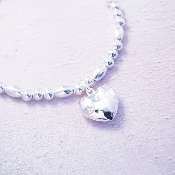 Sterling Silver Bracelet With Hammered Heart Charm